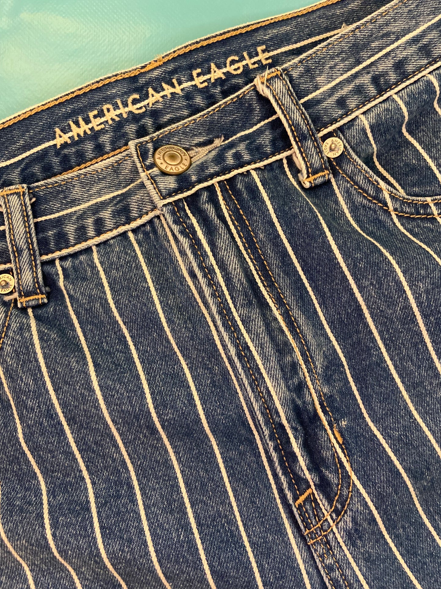 "AMERICAN EAGLE" TAPERED DARK DENIM AND WHITE PINSTRIPE JEANS