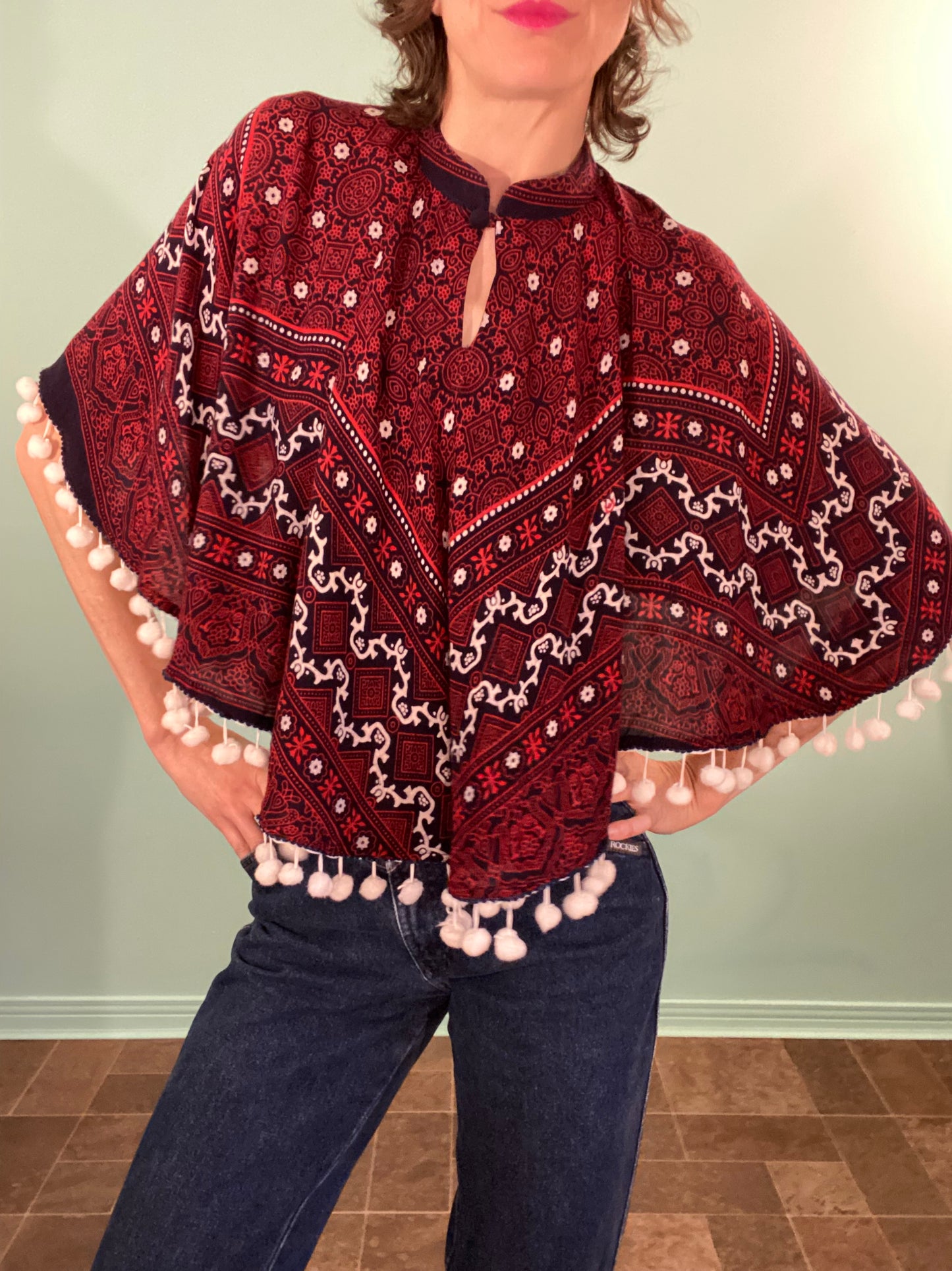 VINTAGE BANDANA PRINT CAPE WITH POM POM TRIM