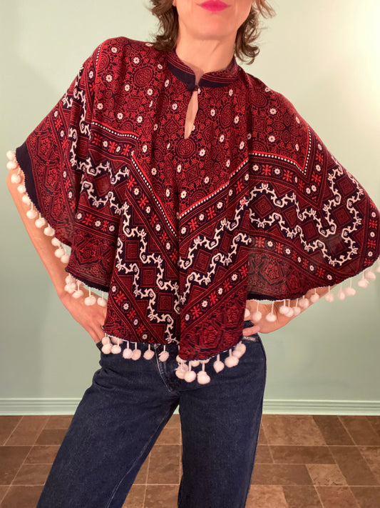 VINTAGE BANDANA PRINT CAPE WITH POM POM TRIM