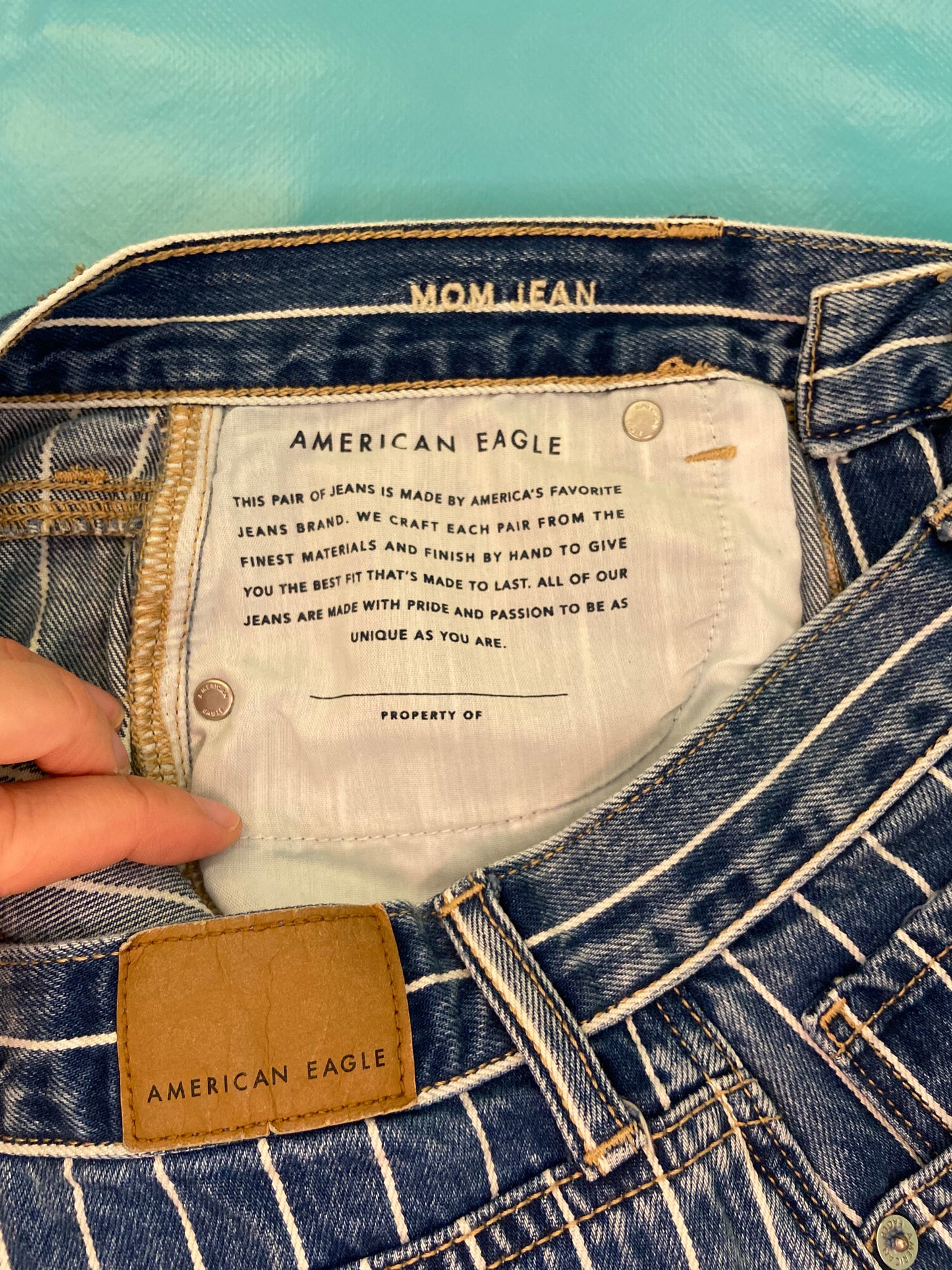 "AMERICAN EAGLE" TAPERED DARK DENIM AND WHITE PINSTRIPE JEANS