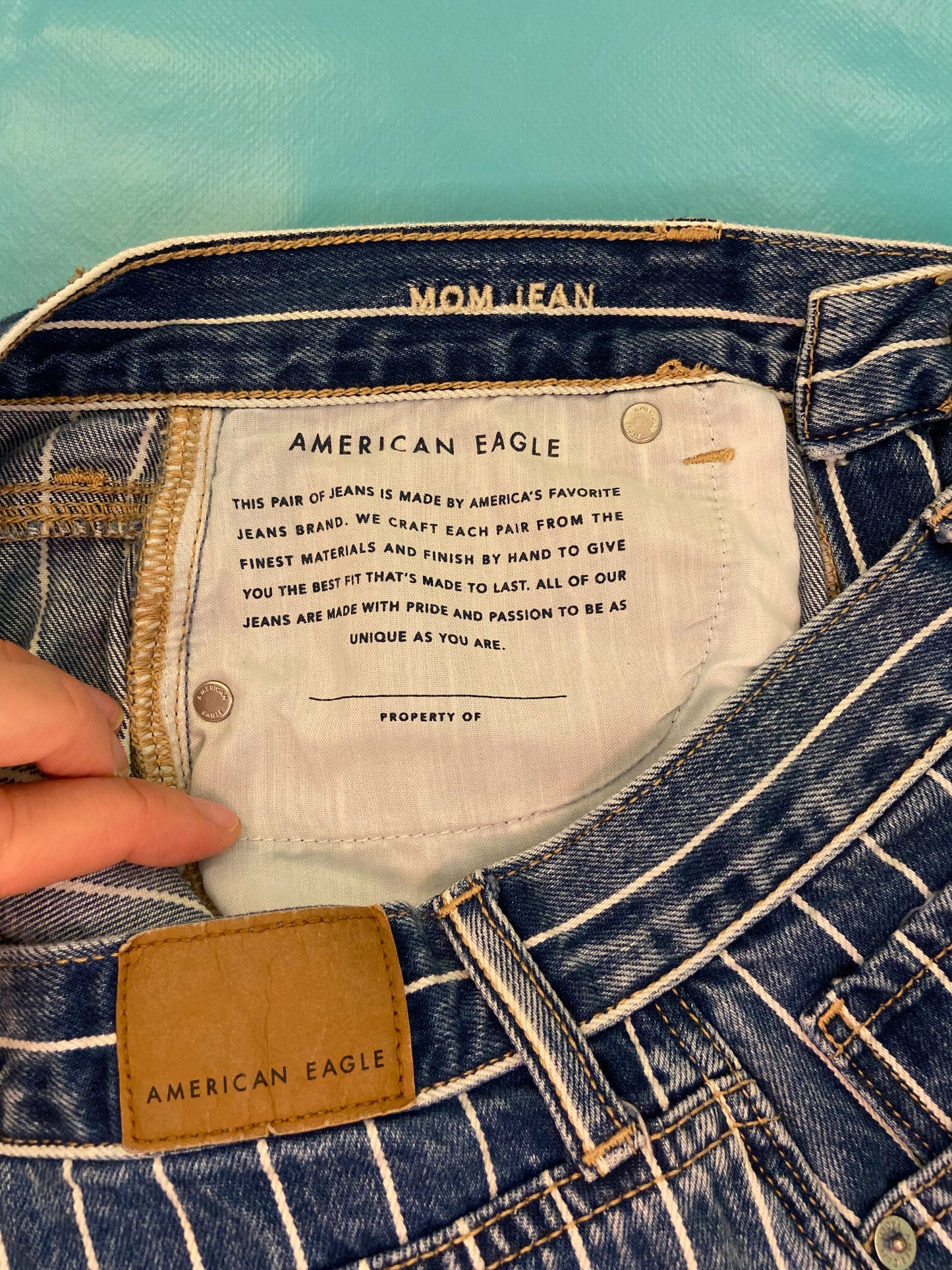 "AMERICAN EAGLE" TAPERED DARK DENIM AND WHITE PINSTRIPE JEANS