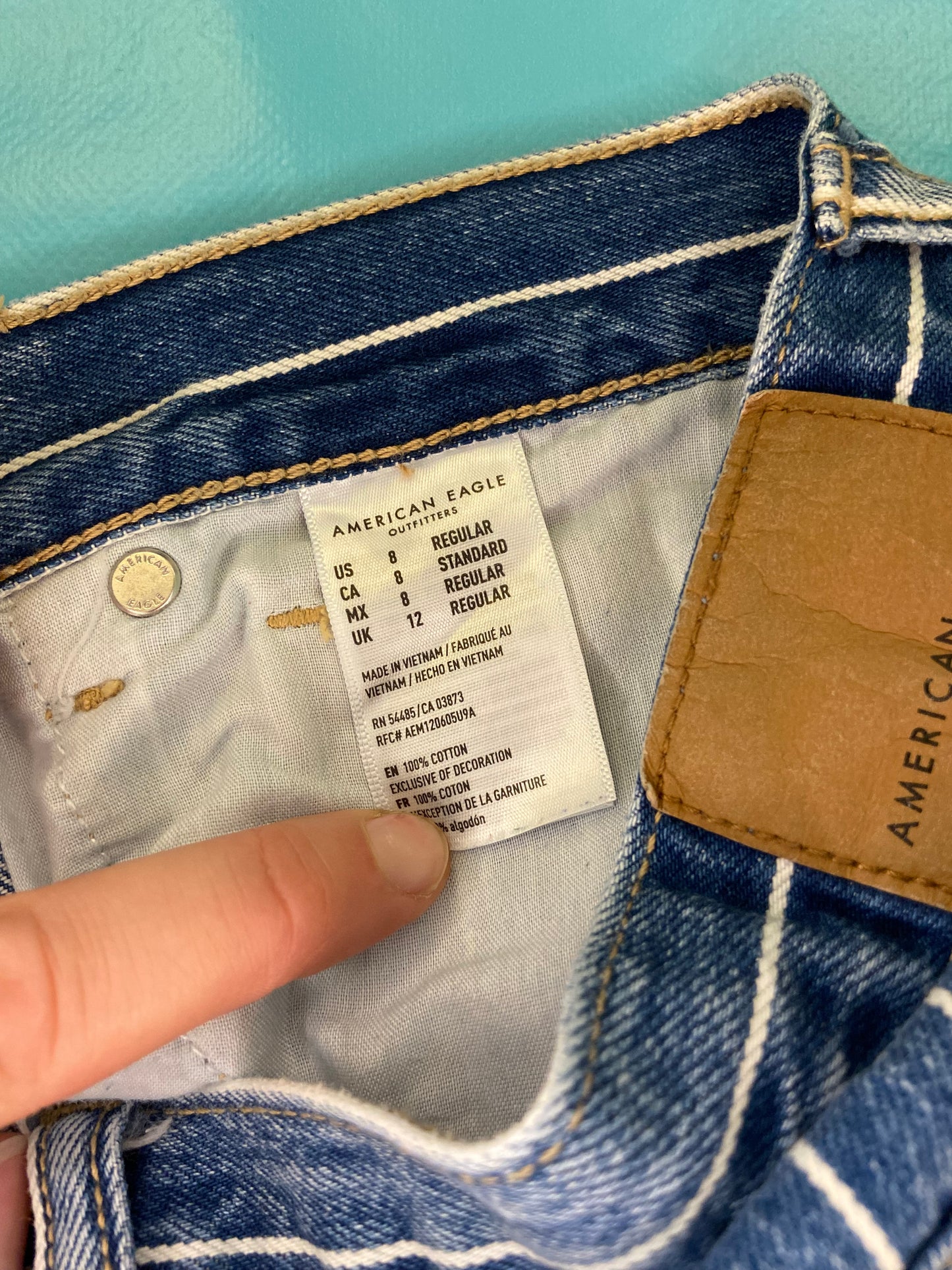 "AMERICAN EAGLE" TAPERED DARK DENIM AND WHITE PINSTRIPE JEANS