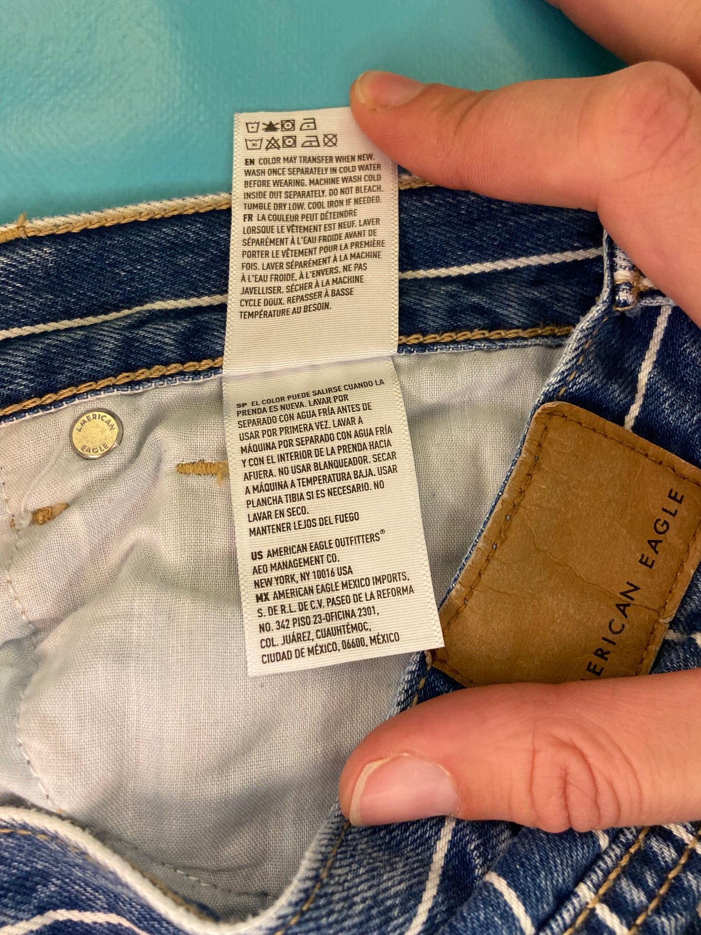 "AMERICAN EAGLE" TAPERED DARK DENIM AND WHITE PINSTRIPE JEANS