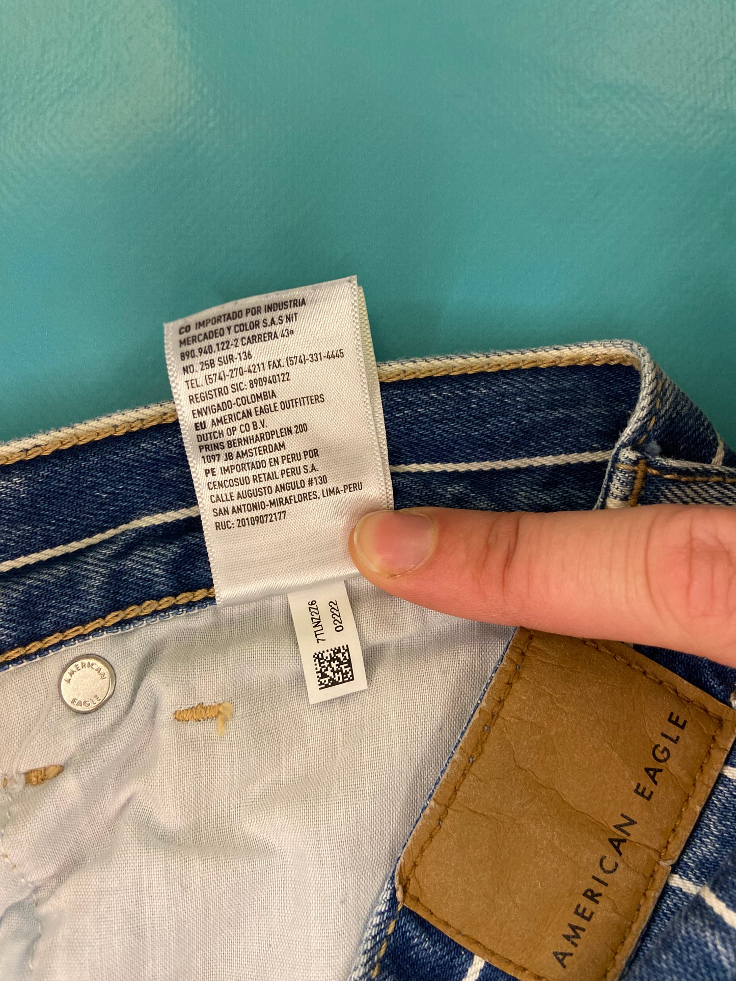 "AMERICAN EAGLE" TAPERED DARK DENIM AND WHITE PINSTRIPE JEANS